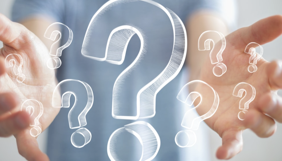 Person holding out hands with question marks